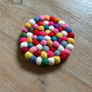 Bubbly colored soft ball drink coaster